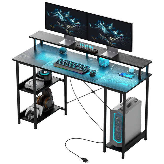 Distressed black computer desk with LED lights, power outlets, and storage shelves.