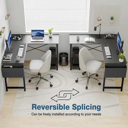 Two black L-shaped computer desks are arranged in a room with white chairs.