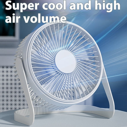 A white USB mini fan with a five-blade design sits on a surface.