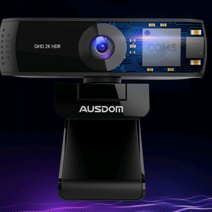 A black webcam with "AUSDOM" on the stand and "QHD 2K HDR" on the camera body.