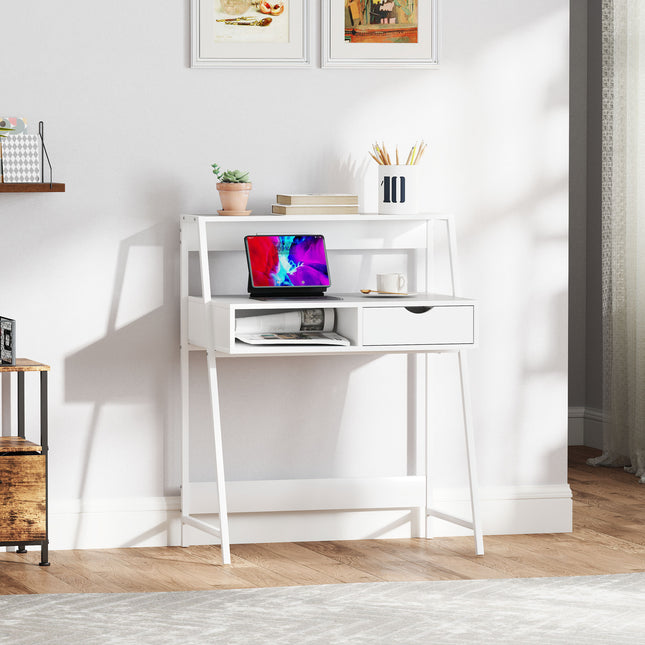 White home office desk with shelves and a drawer, holding a tablet and decor.