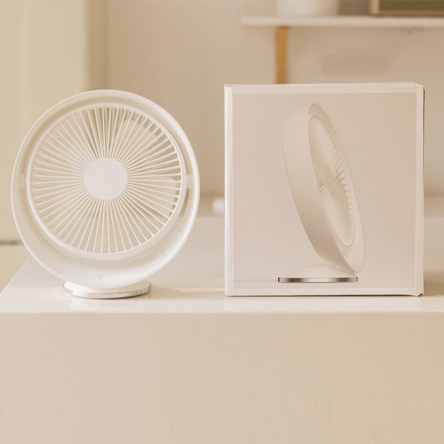 White USB desk fan next to its product box on a light-colored surface.