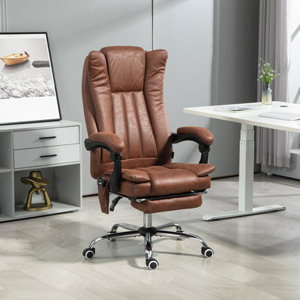 A brown massage office chair with a footrest is positioned in a modern office setting.